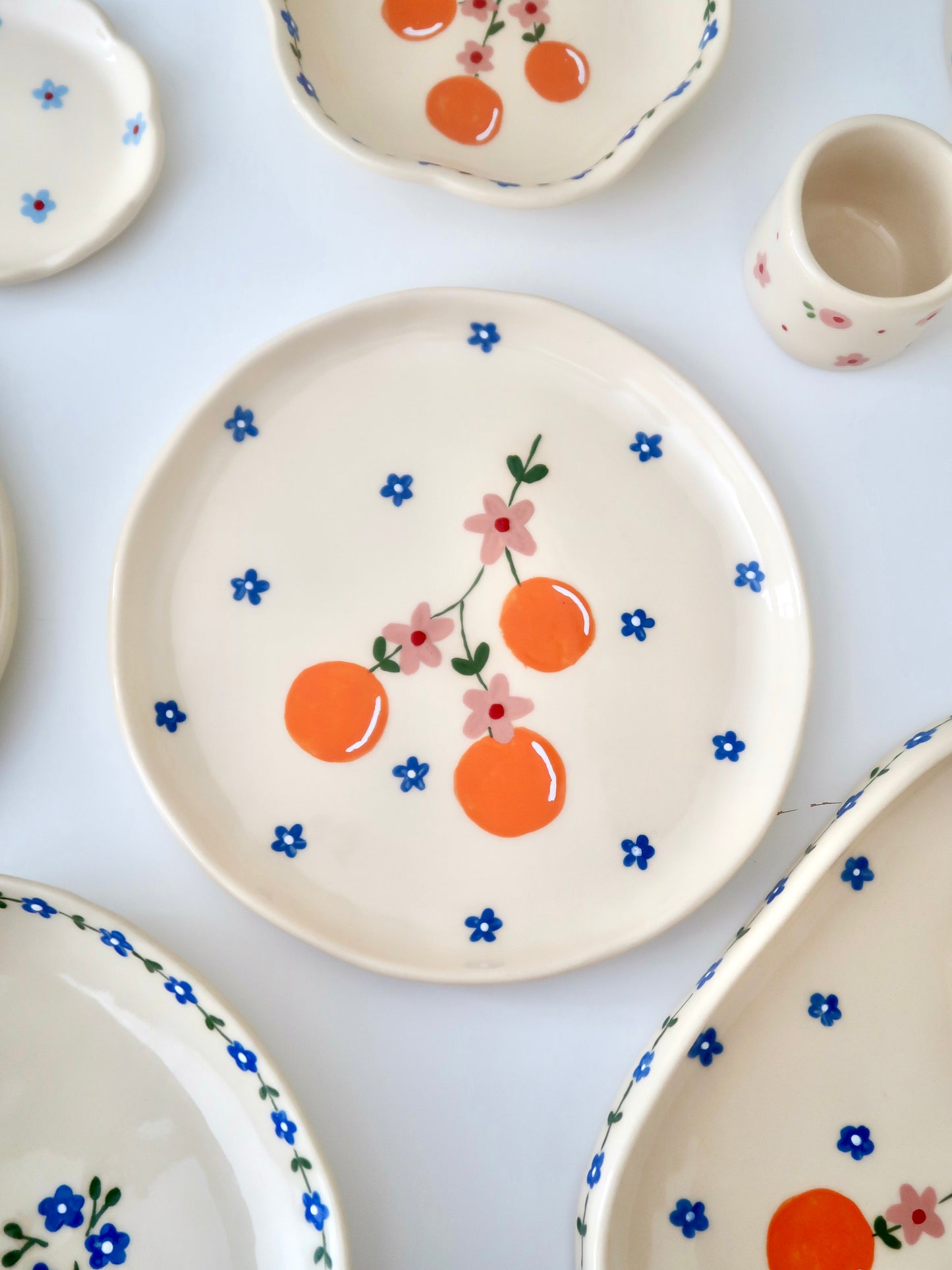 Plate with orange and blue flowers