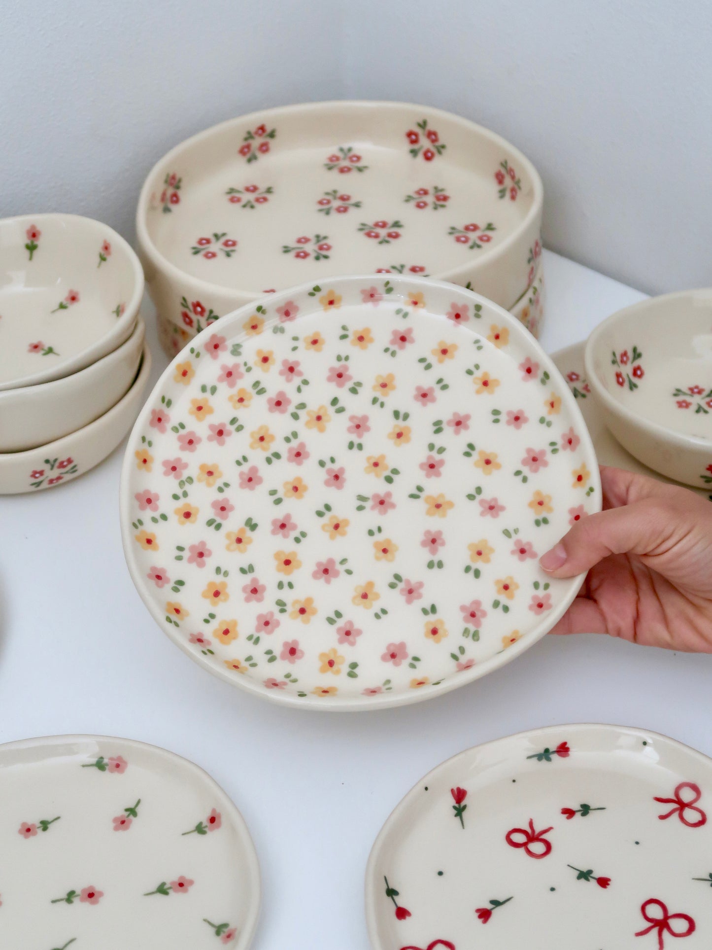 Plate with pink and yellow flowers