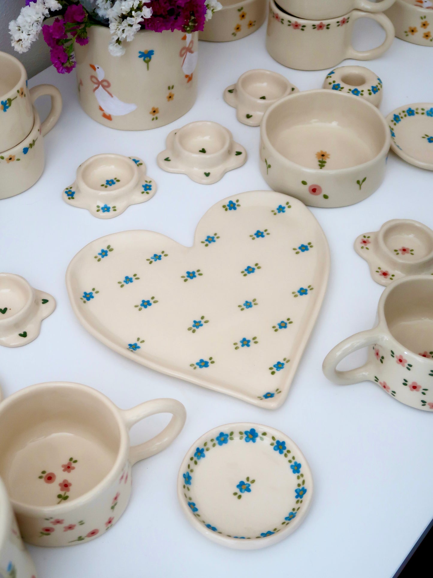 Large heart shaped plate with blue flowers (small imperfection)