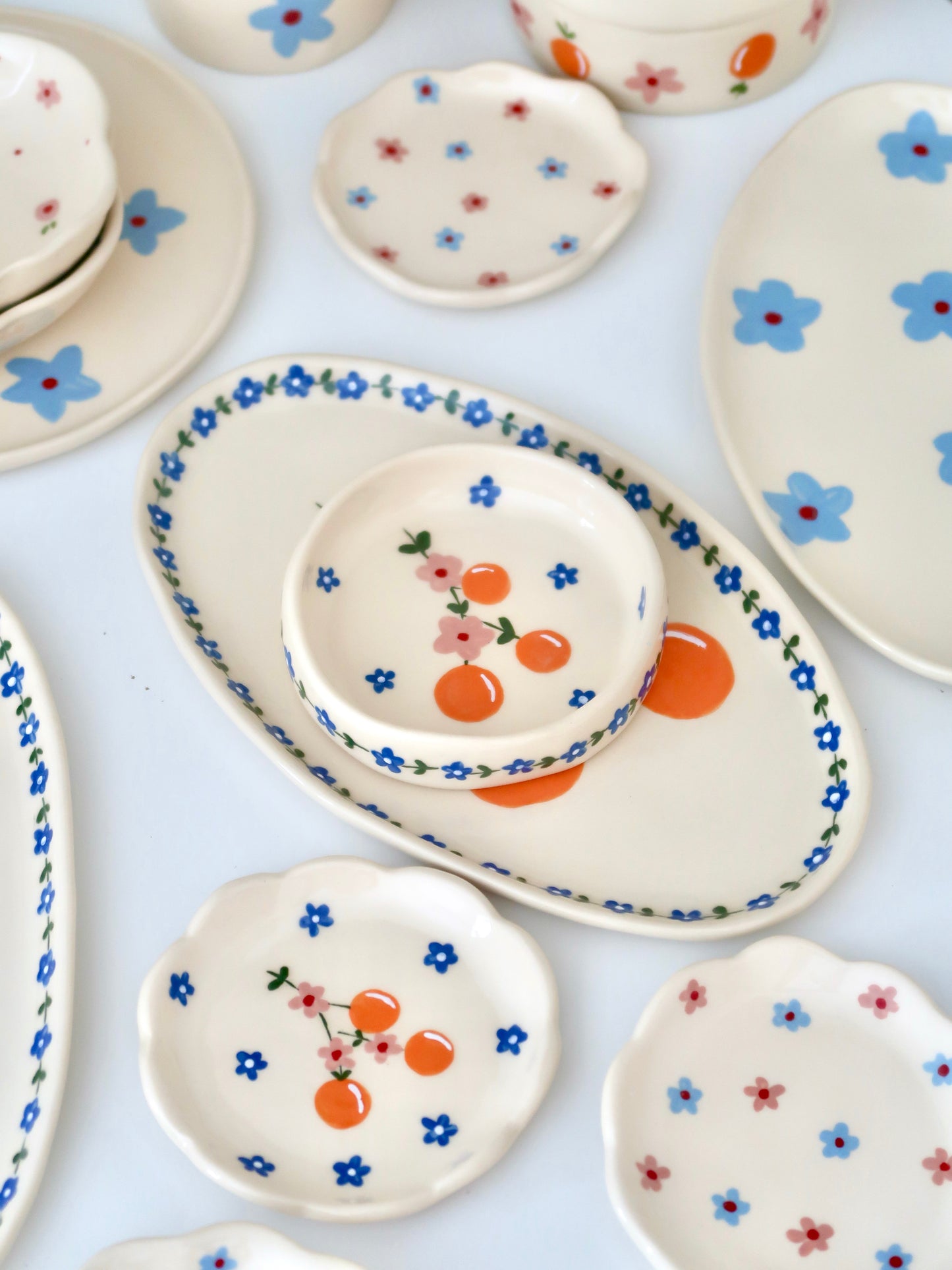 Platter with oranges and blue flowers