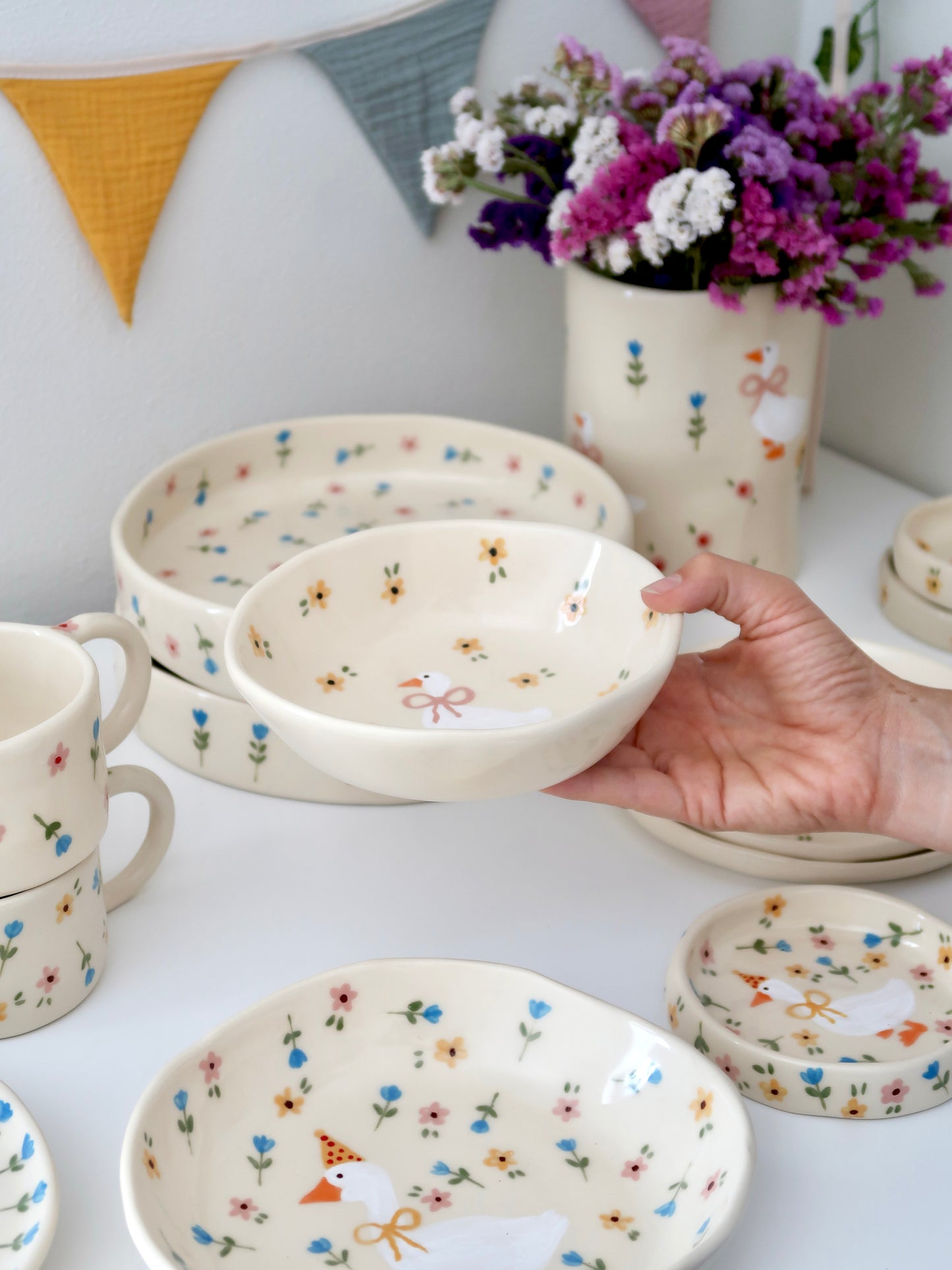 Bowl with a duck and yellow flowers
