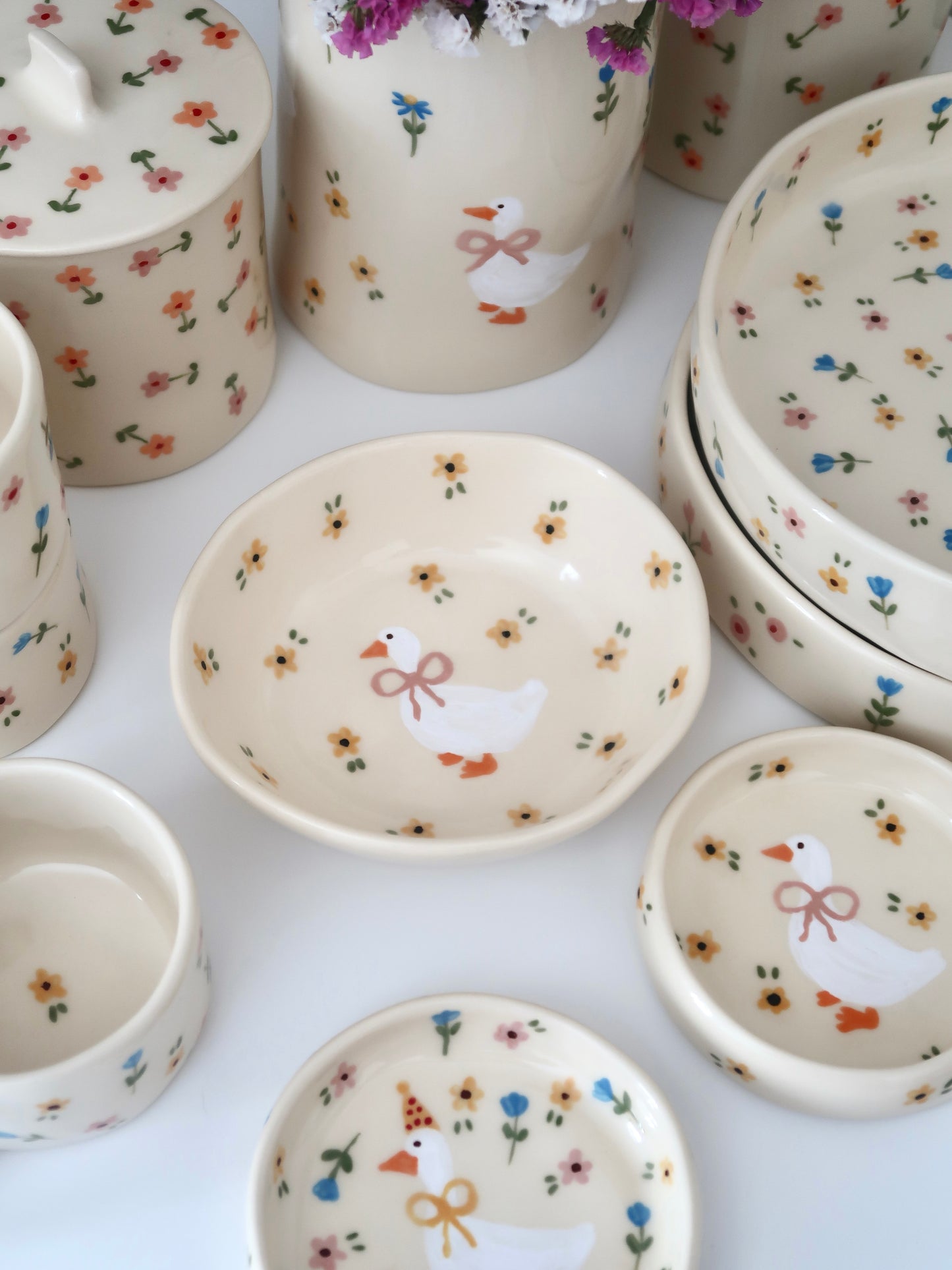Bowl with a duck and yellow flowers