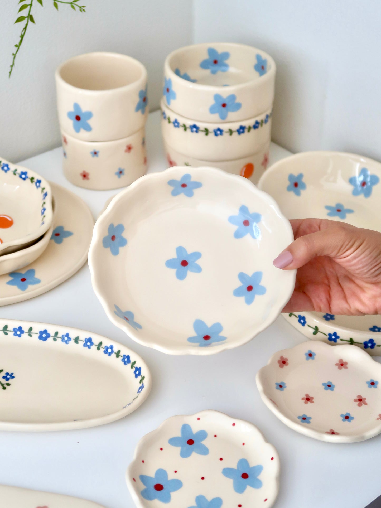 Scalloped bowl with blue flowers flowers