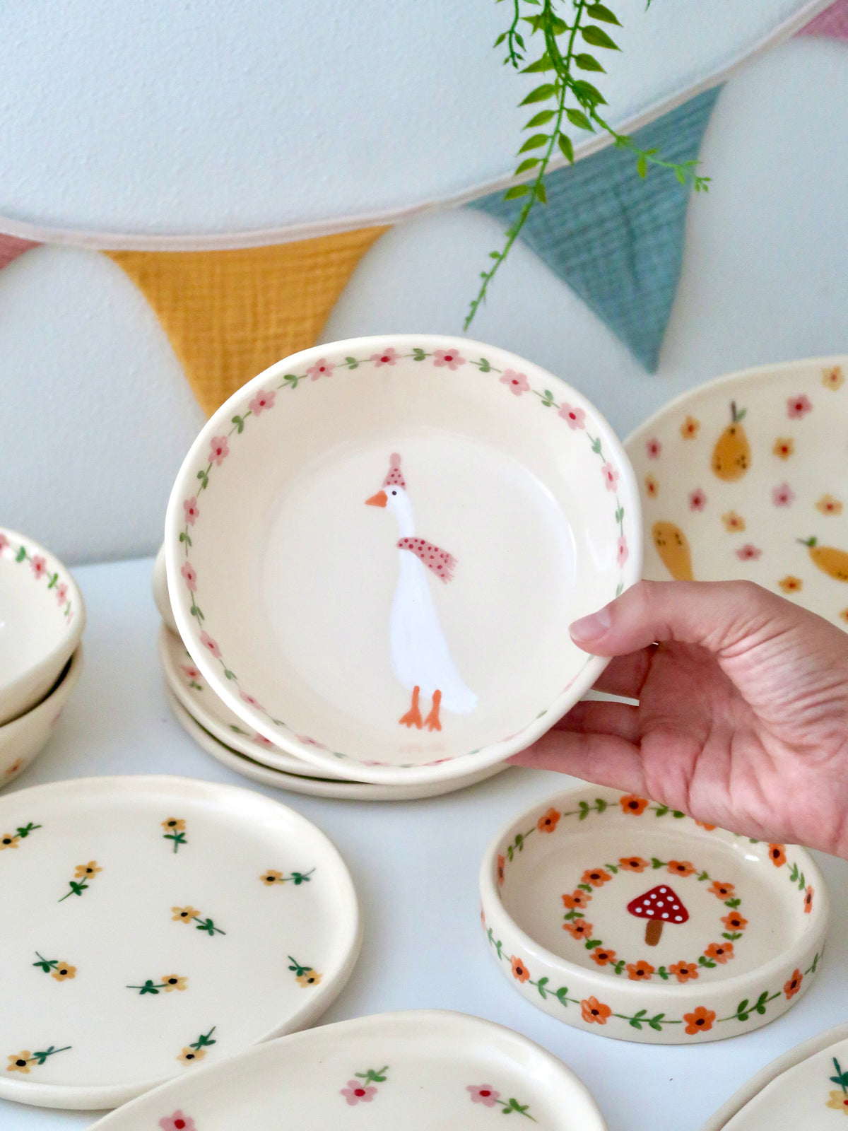 Bowl with a duck and pink flowers