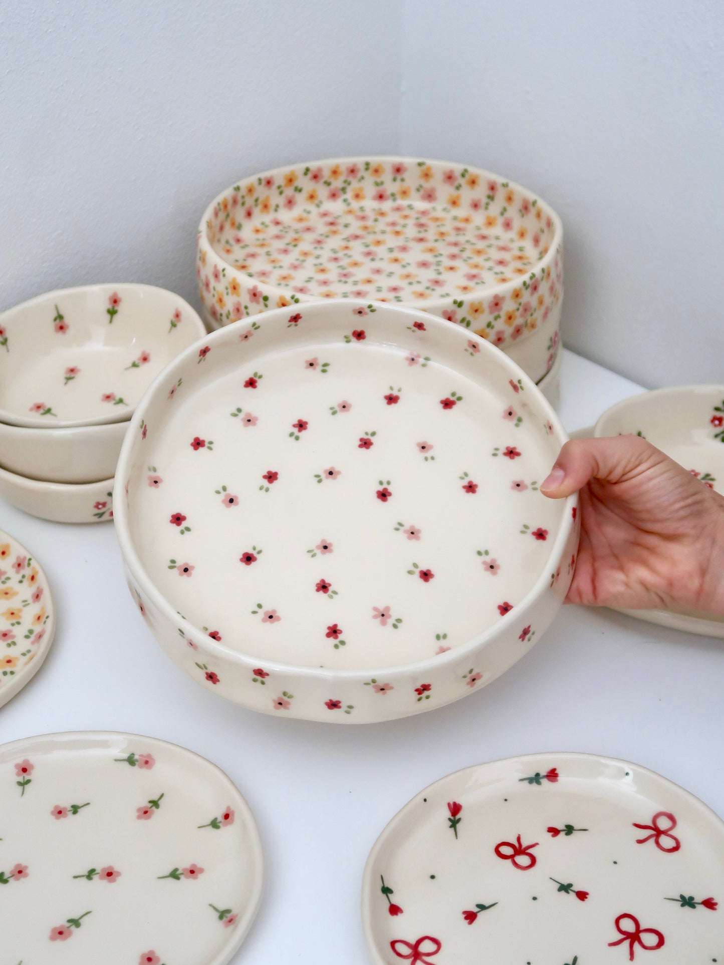 Large bowl with red and pink flowers