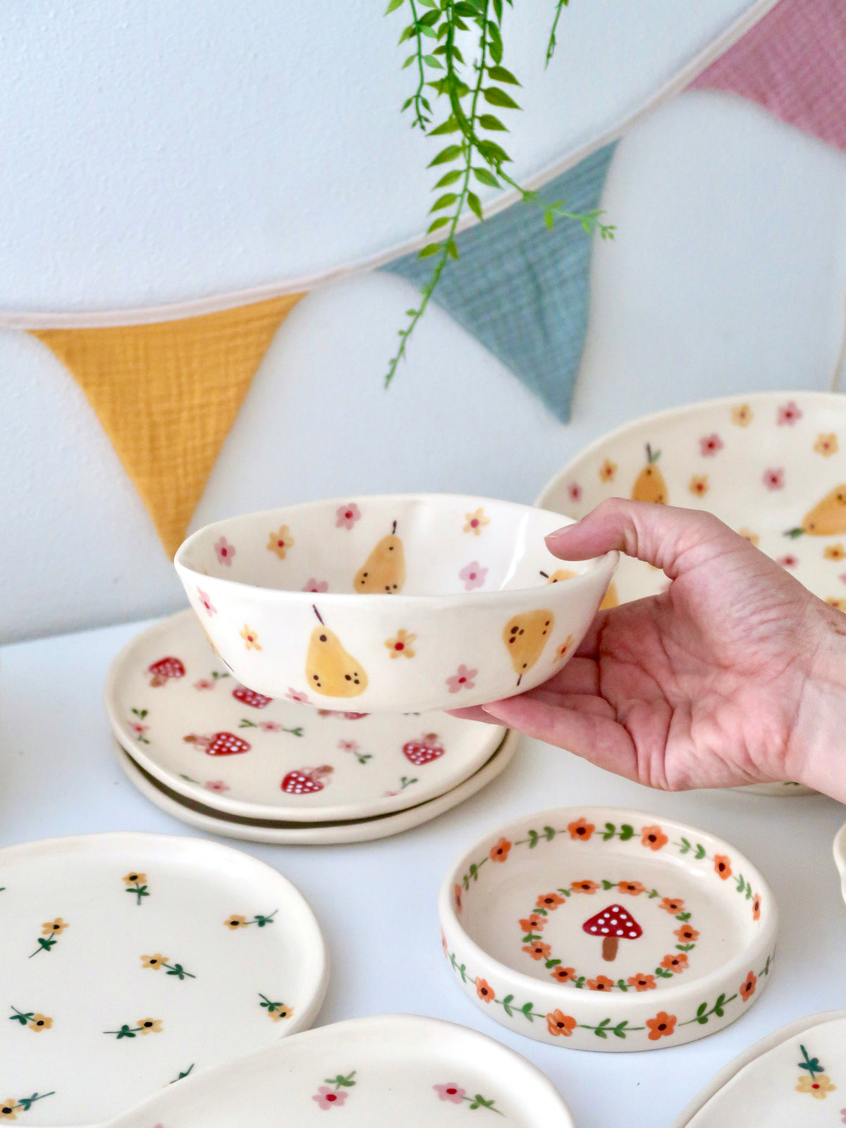 Bowl with pears, yellow and pink flowers