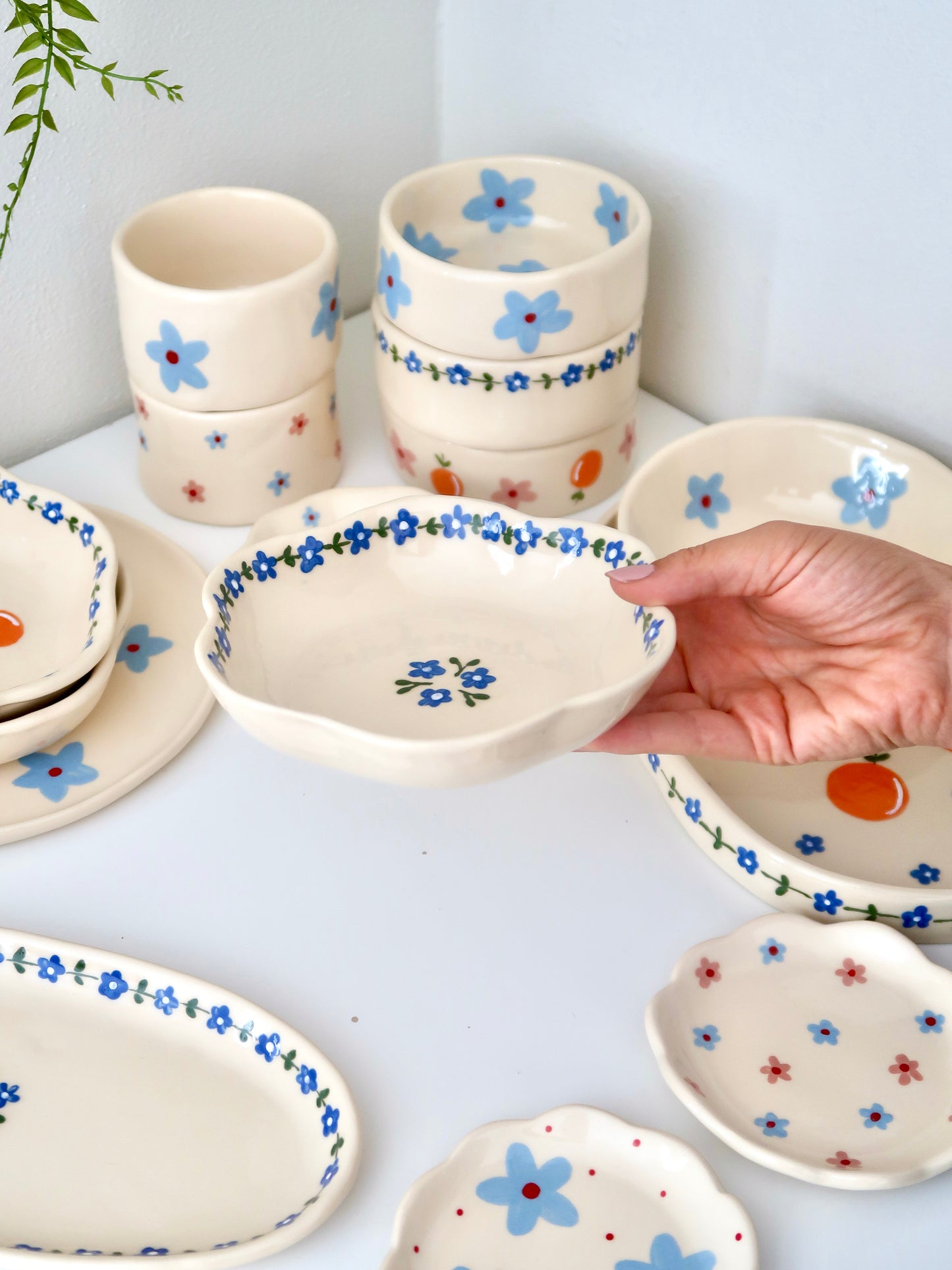 Scalloped bowl with blue flowers flowers