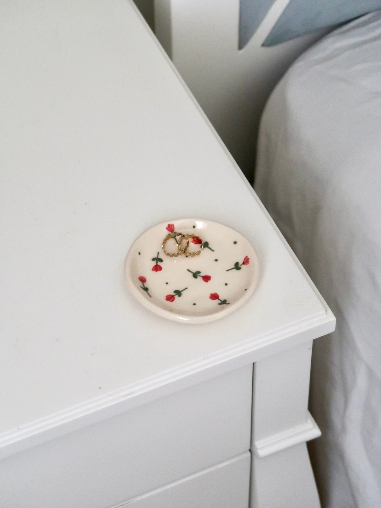 Ring dish with red flowers and green dots