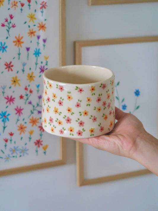 Vase with pink and yellow flowers