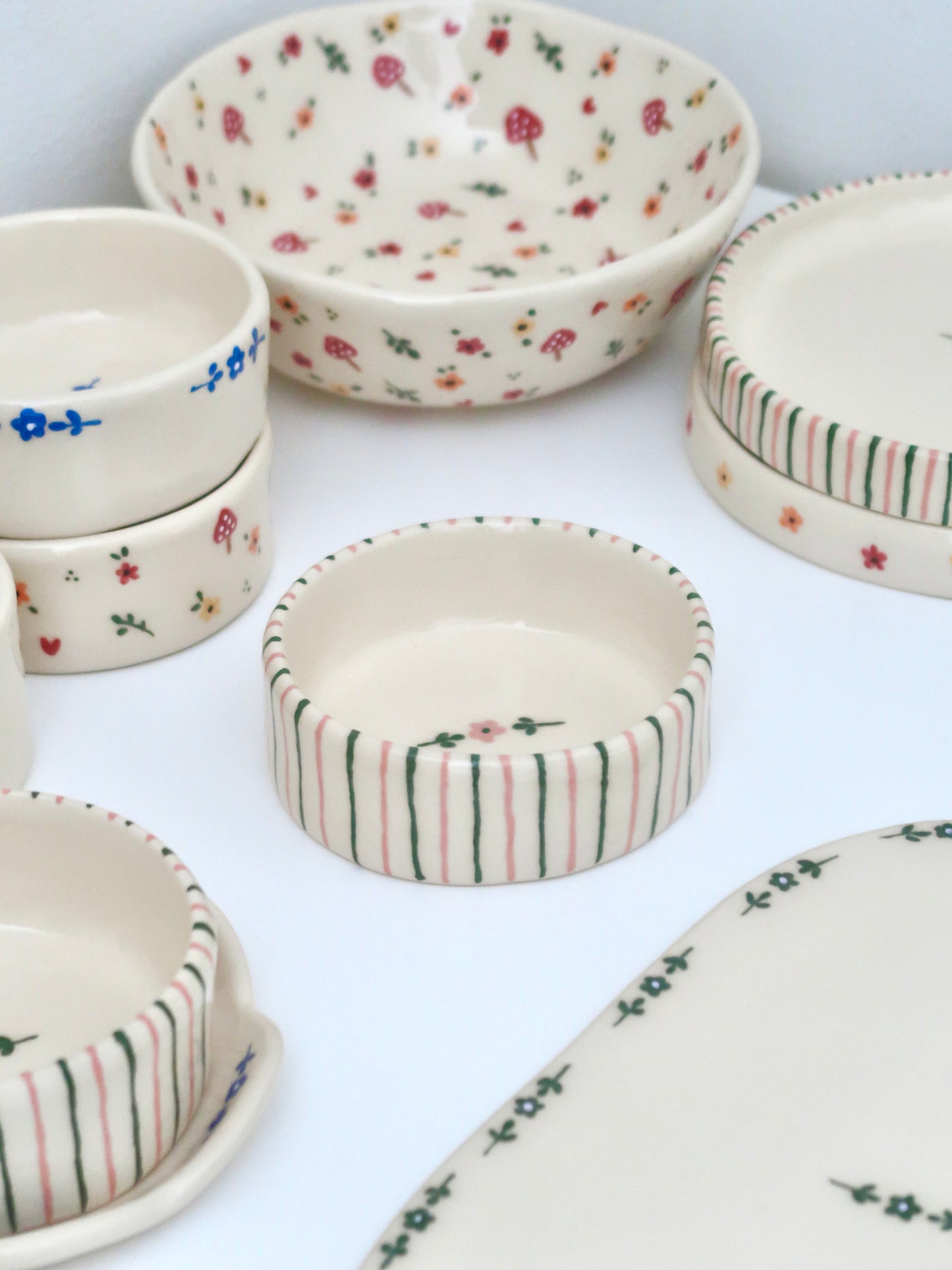Bowl with green and pink flowers