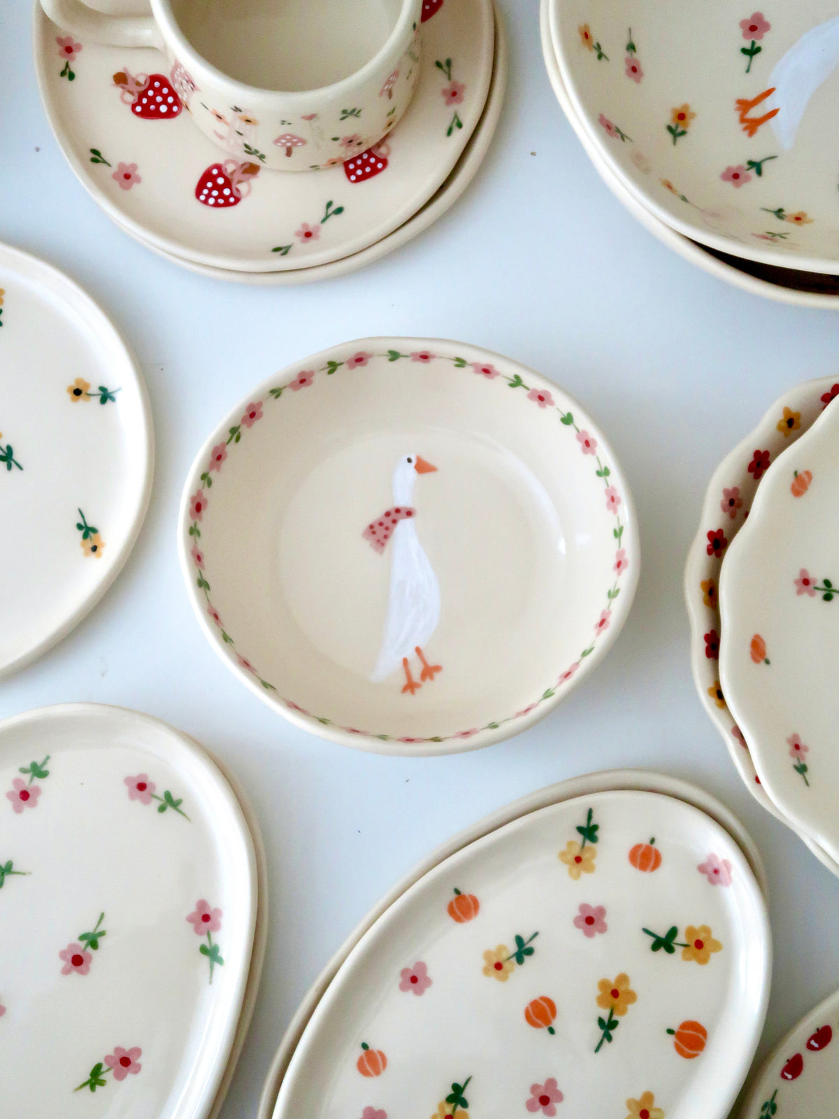 Bowl with a duck and pink flowers
